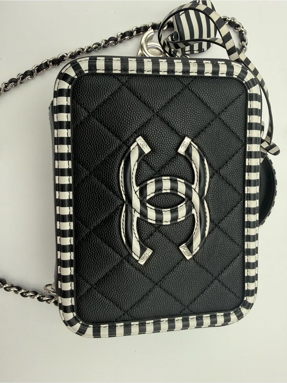 Chanel black and white filigree vanity bag in caviar leather